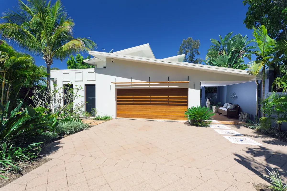 Paved driveway and garden bed planting at a landscaped Gold Coast home